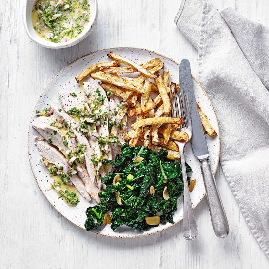 Roast chicken with celeriac chips and garlicky greens
