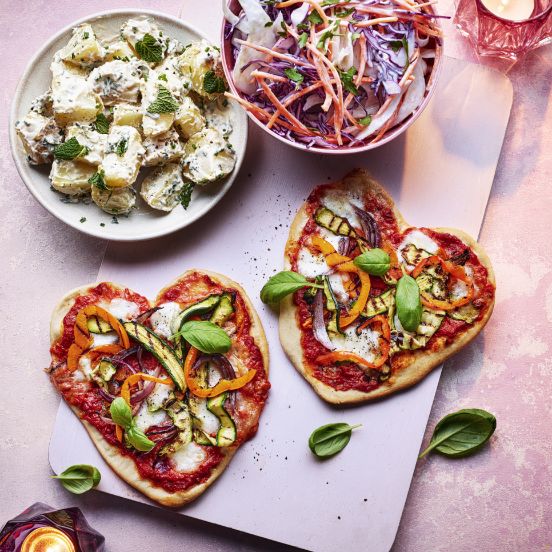 Heart-shape pizzas with rainbow slaw