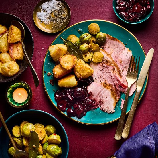 Baked ham with cherry sauce and pickled sprouts