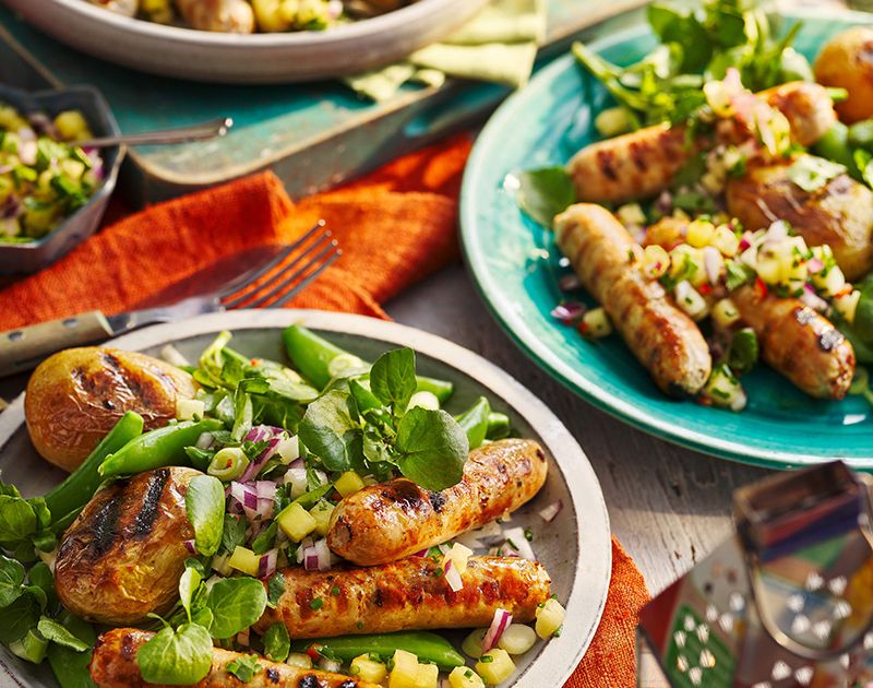 Barbecue sausages with pineapple salsa, roast potatoes and watercress | Slimming World