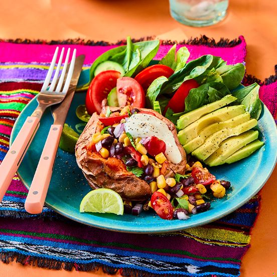 Baked sweet potato with black bean salsa and avocado
